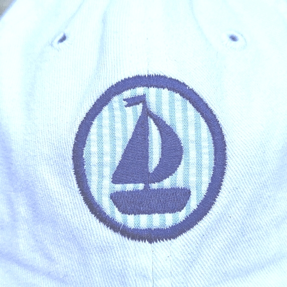 White cap, navy sailboat on light blue seersucker background,  adjustable back - Picture 2 of 8